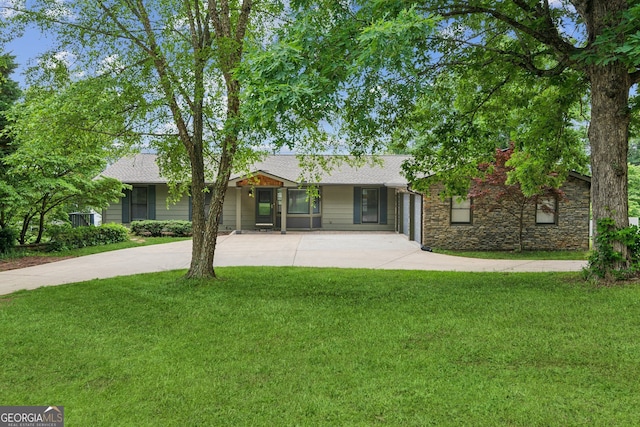2055 Cactus Ln, Cumming, GA 30040 - ranch-style home featuring concrete driveway, a front yard, a shingled roof, and stone siding