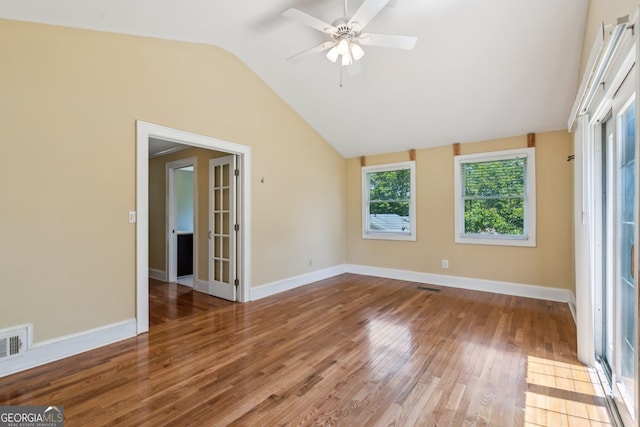2055 Cactus Ln, Cumming, GA 30040 - unfurnished room featuring vaulted ceiling, wood finished floors, and ceiling fan