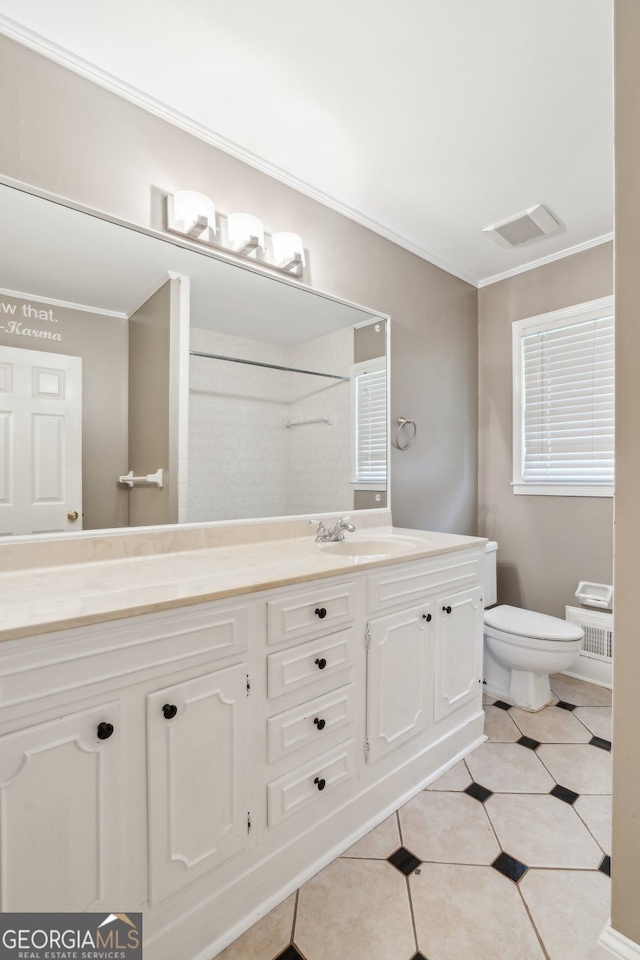 2055 Cactus Ln, Cumming, GA 30040 - bathroom with vanity, ornamental molding, tile patterned flooring, and a shower