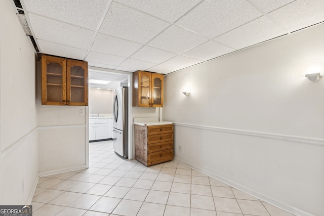 2055 Cactus Ln, Cumming, GA 30040 - empty room with a paneled ceiling and light tile patterned floors