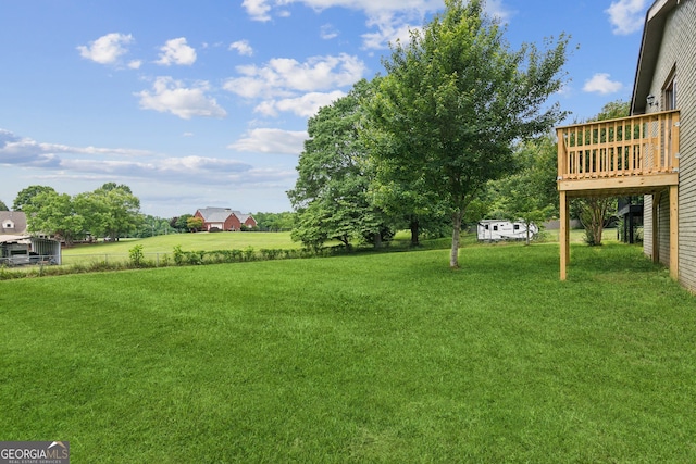 2055 Cactus Ln, Cumming, GA 30040 - view of grassy yard featuring a deck