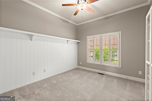 1286 Whisper Cove Dr, Buford, GA 30518 - carpeted spare room featuring a ceiling fan and crown molding
