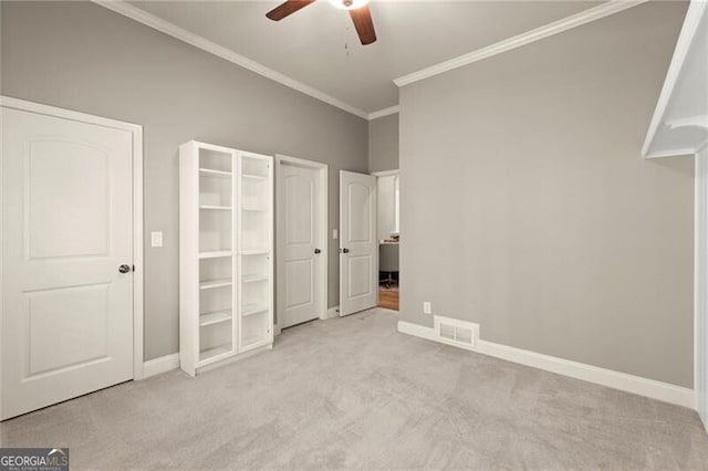1286 Whisper Cove Dr, Buford, GA 30518 - unfurnished bedroom featuring carpet, crown molding, and a ceiling fan