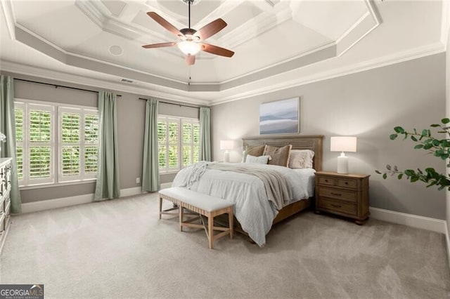 1286 Whisper Cove Dr, Buford, GA 30518 - bedroom featuring crown molding, light colored carpet, a tray ceiling, and a ceiling fan
