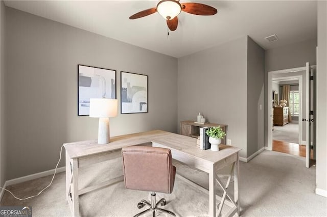 1286 Whisper Cove Dr, Buford, GA 30518 - carpeted home office with baseboards and ceiling fan
