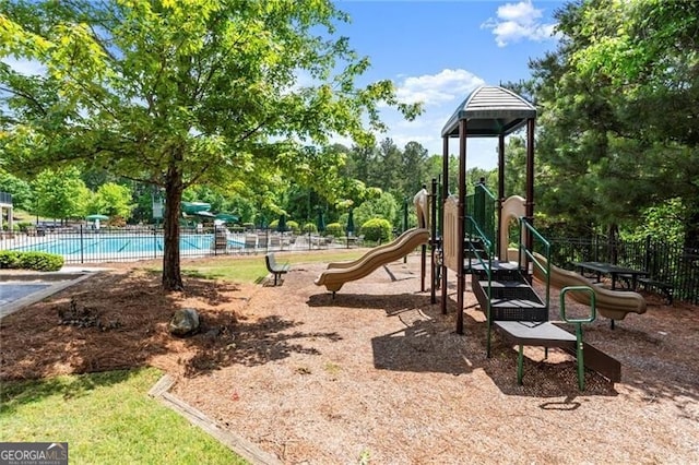 1286 Whisper Cove Dr, Buford, GA 30518 - communal playground with view of scattered trees
