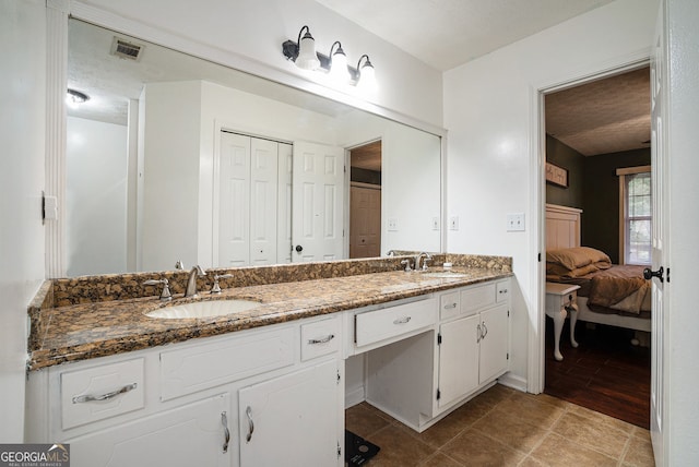 1235 Waterwood Dr, Loganville, GA 30052 - ensuite bathroom featuring double vanity