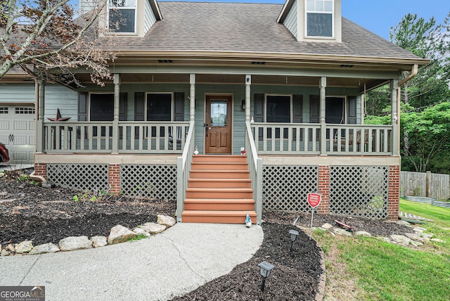 1235 Waterwood Dr, Loganville, GA 30052 - view of front of property with covered porch and roof with shingles