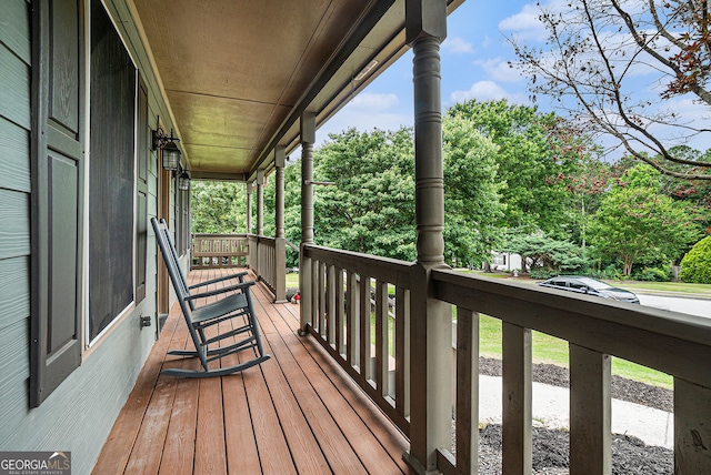1235 Waterwood Dr, Loganville, GA 30052 - porch with view of scattered trees