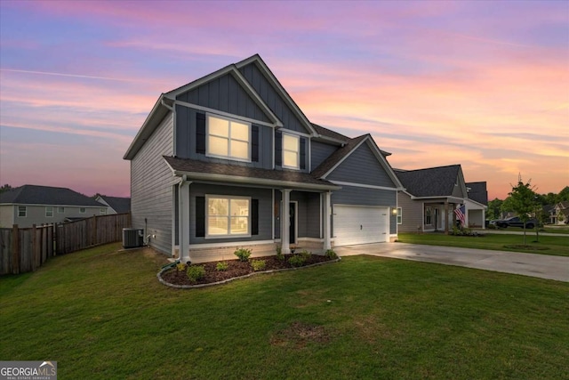 123 Cedar Park Way, Carrollton, GA 30117 - view of front of property with board and batten siding, concrete driveway, central air condition unit, and an attached garage