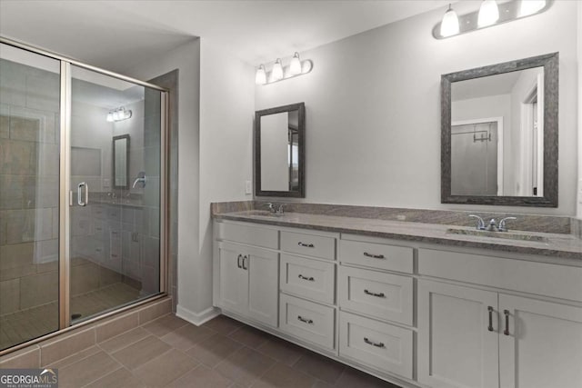 123 Cedar Park Way, Carrollton, GA 30117 - full bath featuring a stall shower, double vanity, tile patterned floors, and baseboards
