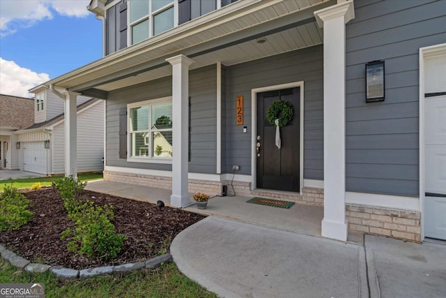 123 Cedar Park Way, Carrollton, GA 30117 - entrance to property with a porch and an attached garage