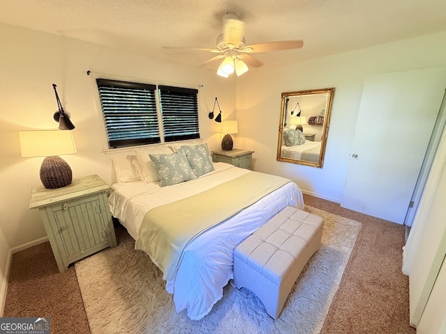 3095 Holbrook Dr SW, Marietta, GA 30060 - bedroom with light carpet, ceiling fan, a textured ceiling, and baseboards