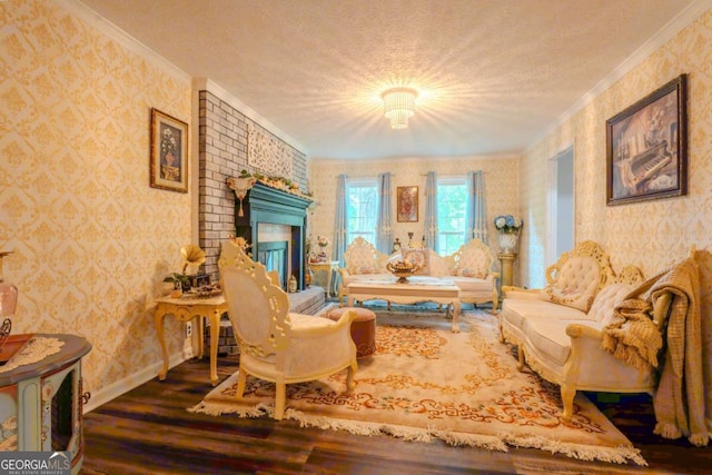 5293 Sandy Shoals Ln, Stone Mountain, GA 30087 - living area featuring wallpapered walls, wood finished floors, crown molding, baseboards, and a textured ceiling