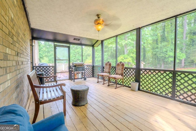 5293 Sandy Shoals Ln, Stone Mountain, GA 30087 - sunroom featuring ceiling fan