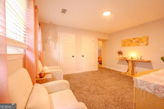 5293 Sandy Shoals Ln, Stone Mountain, GA 30087 - carpeted living room featuring baseboards