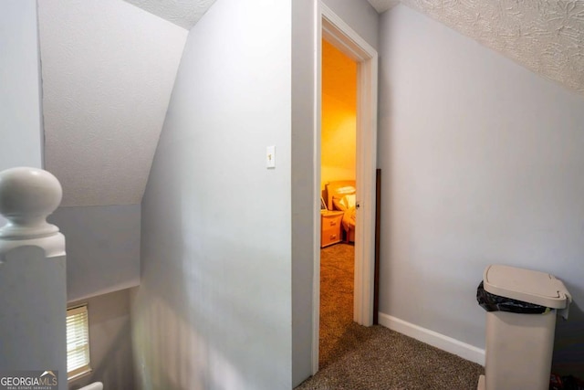 5293 Sandy Shoals Ln, Stone Mountain, GA 30087 - hallway with carpet, a textured ceiling, and baseboards