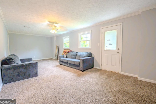 5293 Sandy Shoals Ln, Stone Mountain, GA 30087 - carpeted living area featuring ornamental molding, baseboards, a textured ceiling, and ceiling fan