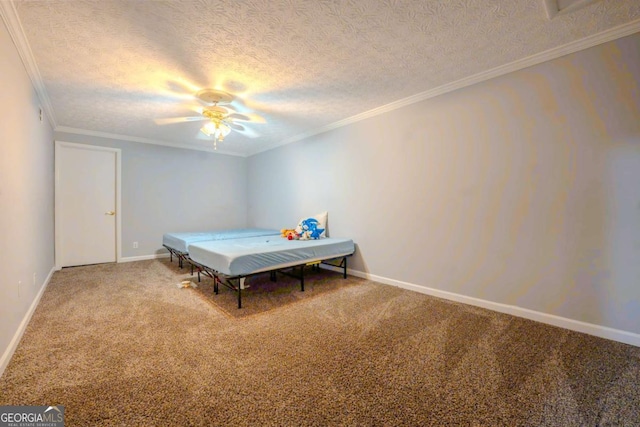 5293 Sandy Shoals Ln, Stone Mountain, GA 30087 - game room featuring carpet floors, a textured ceiling, ornamental molding, ceiling fan, and baseboards
