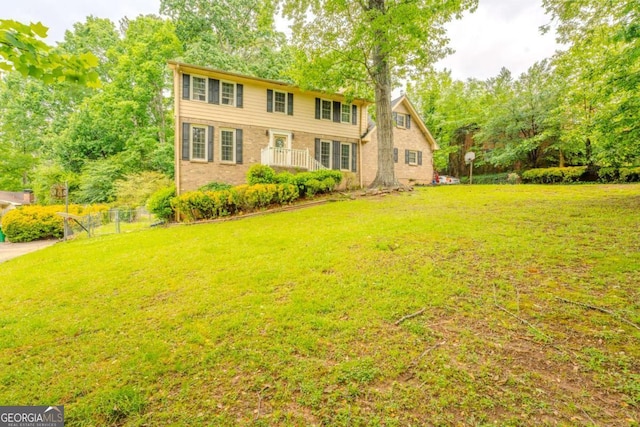 5293 Sandy Shoals Ln, Stone Mountain, GA 30087 - colonial-style house with brick siding