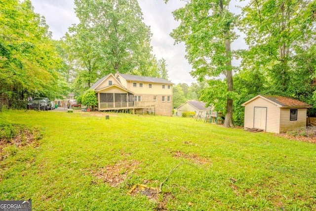 5293 Sandy Shoals Ln, Stone Mountain, GA 30087 - view of grassy yard featuring a sunroom and view of scattered trees