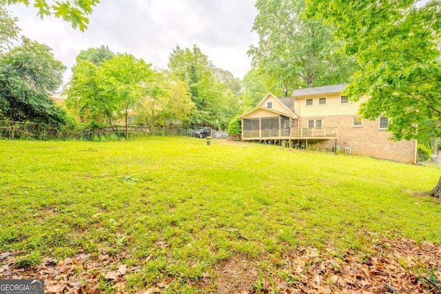 5293 Sandy Shoals Ln, Stone Mountain, GA 30087 - view of yard with a sunroom