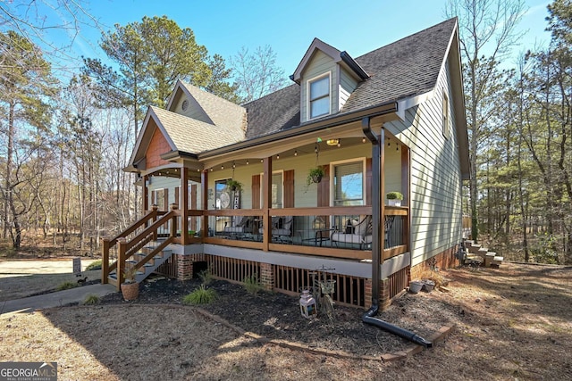 9001 E Carroll Rd, Winston, GA 30187 - view of front of property featuring covered porch, roof with shingles, and stairs