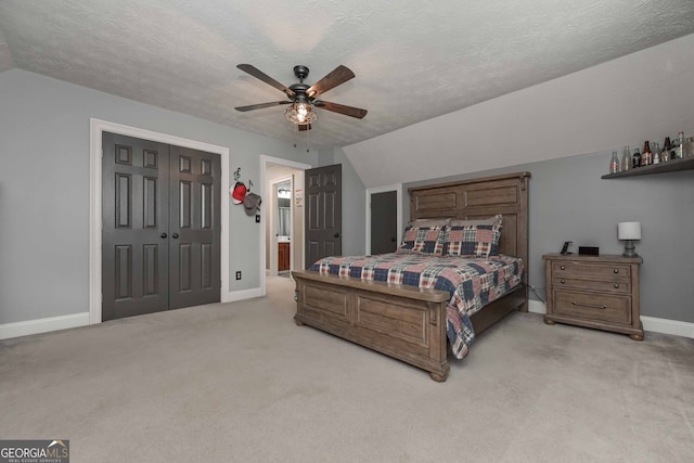 9001 E Carroll Rd, Winston, GA 30187 - bedroom featuring lofted ceiling, carpet floors, baseboards, a ceiling fan, and a closet