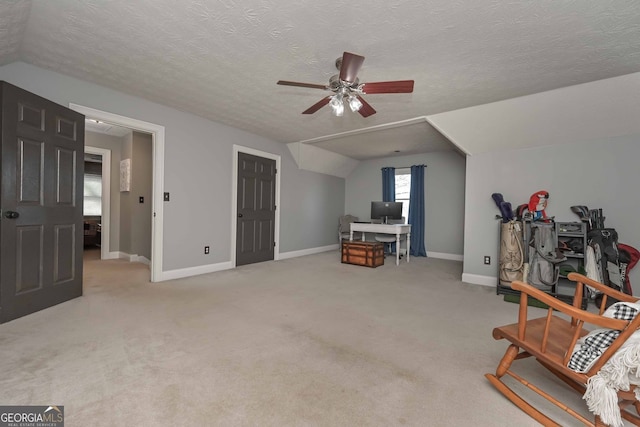 9001 E Carroll Rd, Winston, GA 30187 - sitting room with a ceiling fan, baseboards, an office area, light colored carpet, and vaulted ceiling