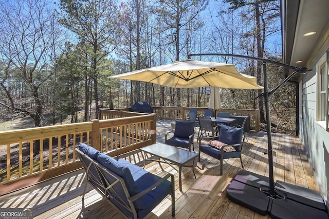9001 E Carroll Rd, Winston, GA 30187 - wooden deck with outdoor dining space and an outdoor living space