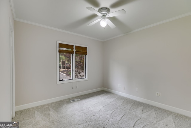 921 Oak Dr, Woodstock, GA 30189 - carpeted empty room with ornamental molding, ceiling fan, and baseboards