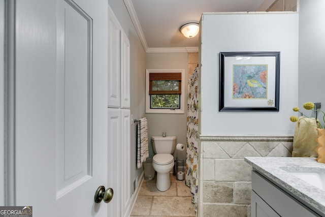 921 Oak Dr, Woodstock, GA 30189 - bathroom with ornamental molding, vanity, toilet, a wainscoted wall, and curtained shower