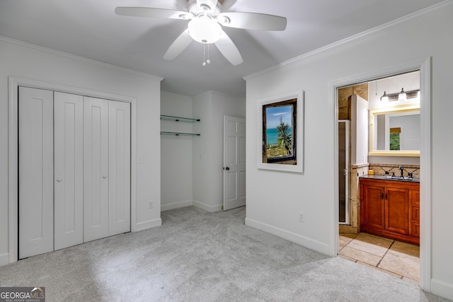 921 Oak Dr, Woodstock, GA 30189 - unfurnished bedroom with carpet floors, crown molding, a sink, baseboards, and ensuite bathroom