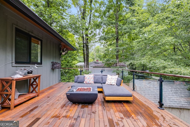 921 Oak Dr, Woodstock, GA 30189 - deck with an outdoor living space with a fire pit