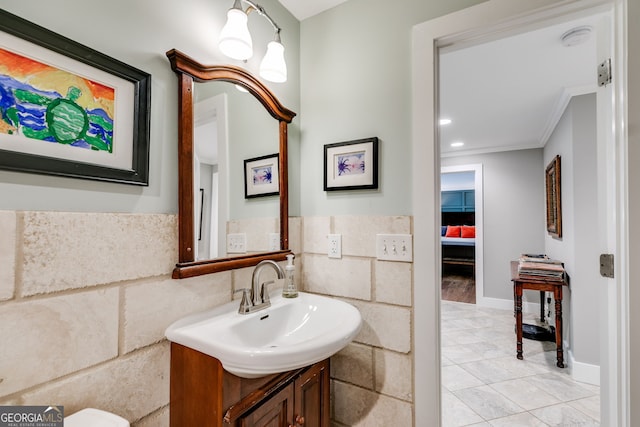 921 Oak Dr, Woodstock, GA 30189 - bathroom featuring vanity, tile patterned flooring, ornamental molding, and baseboards