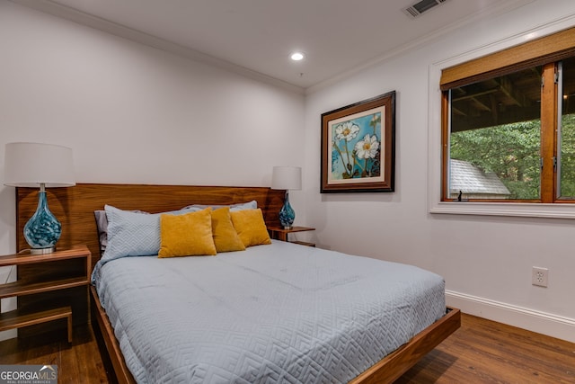 921 Oak Dr, Woodstock, GA 30189 - bedroom featuring wood finished floors, crown molding, baseboards, and recessed lighting