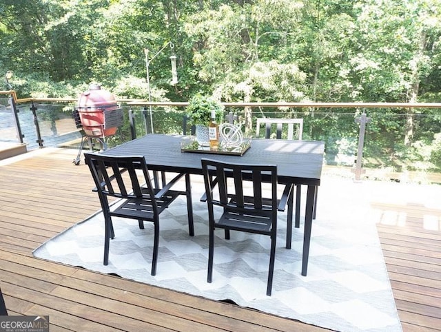 921 Oak Dr, Woodstock, GA 30189 - wooden deck featuring outdoor dining space