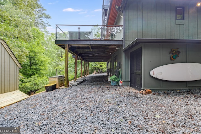 921 Oak Dr, Woodstock, GA 30189 - view of side of property with a deck