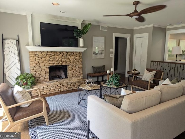 921 Oak Dr, Woodstock, GA 30189 - living room with a ceiling fan, crown molding, a fireplace, recessed lighting, and wood finished floors