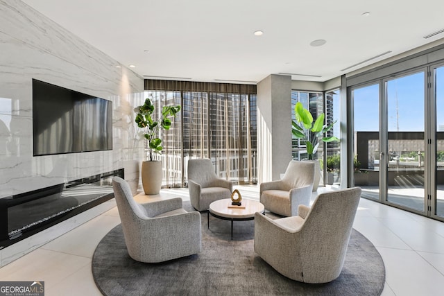 3107 Peachtree Rd NE Unit 2003Aka Ph3, Atlanta, GA 30305 - sitting room with floor to ceiling windows, healthy amount of natural light, and tile patterned floors