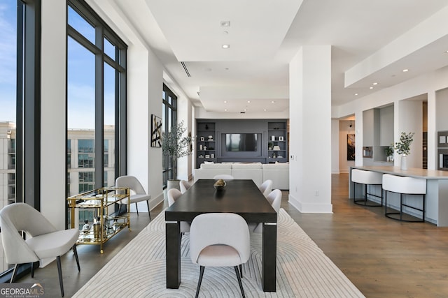 3107 Peachtree Rd NE Unit 2003Aka Ph3, Atlanta, GA 30305 - dining space featuring dark wood-type flooring, baseboards, and recessed lighting