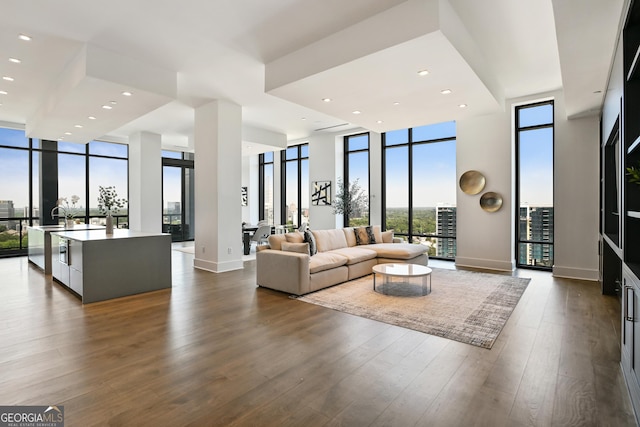 3107 Peachtree Rd NE Unit 2003Aka Ph3, Atlanta, GA 30305 - living room featuring floor to ceiling windows, wood finished floors, baseboards, and recessed lighting