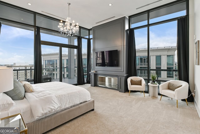 3107 Peachtree Rd NE Unit 2003Aka Ph3, Atlanta, GA 30305 - bedroom featuring a wall of windows, a chandelier, multiple windows, carpet floors, and recessed lighting