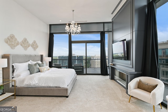 3107 Peachtree Rd NE Unit 2003Aka Ph3, Atlanta, GA 30305 - bedroom with expansive windows, a chandelier, multiple windows, light colored carpet, and access to exterior