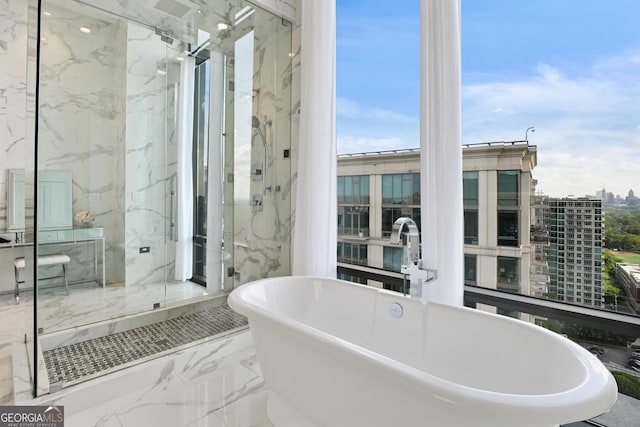 3107 Peachtree Rd NE Unit 2003Aka Ph3, Atlanta, GA 30305 - full bathroom featuring a marble finish shower, a freestanding bath, and marble tiled flooring