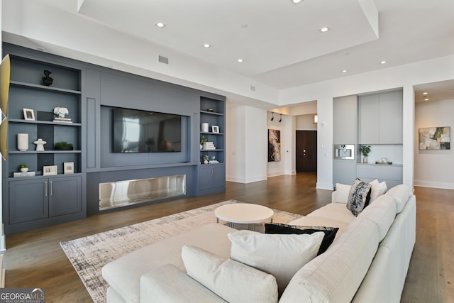 3107 Peachtree Rd NE Unit 2003Aka Ph3, Atlanta, GA 30305 - living room featuring dark wood-style floors, recessed lighting, baseboards, and built in features