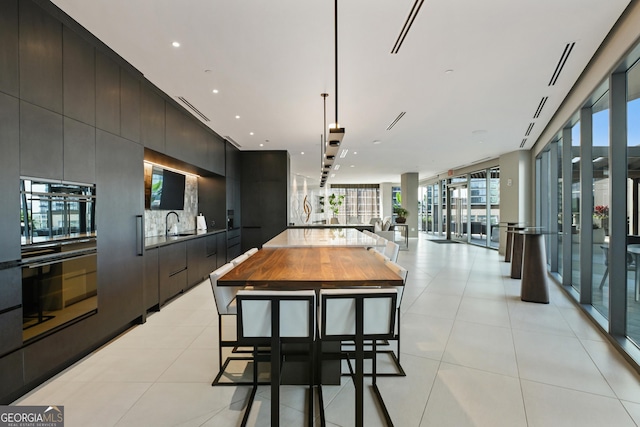 3107 Peachtree Rd NE Unit 2003Aka Ph3, Atlanta, GA 30305 - dining space with recessed lighting and light tile patterned floors