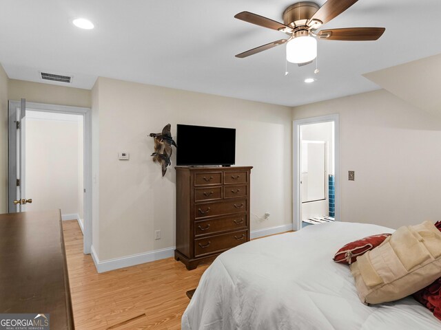 bedroom with baseboards, light wood finished floors, recessed lighting, and a ceiling fan