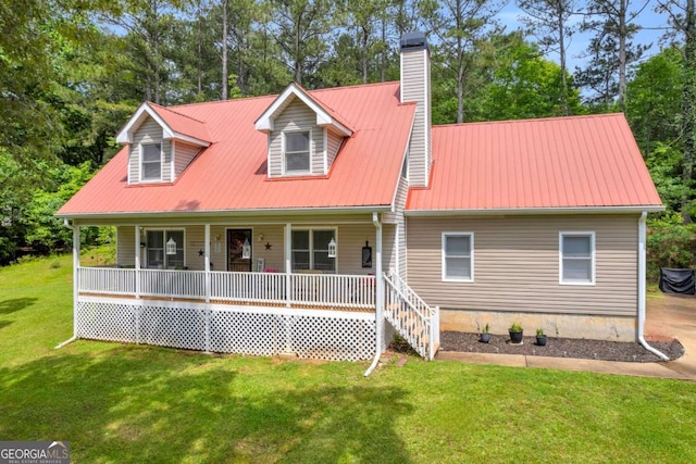 188 Mayapple Gln, Dawsonville, GA 30534 - cape cod-style house with a chimney, covered porch, a front yard, and metal roof