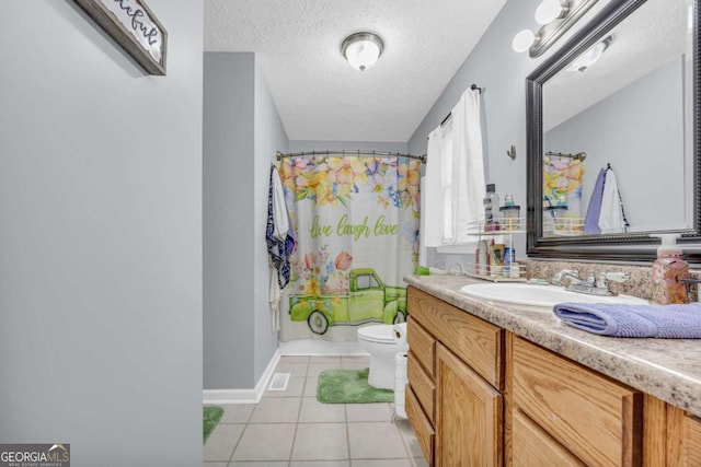 188 Mayapple Gln, Dawsonville, GA 30534 - full bathroom with tile patterned flooring, toilet, curtained shower, vanity, and a textured ceiling